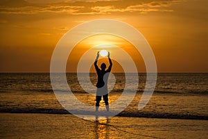 Man Holding The Sun