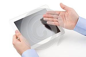 Man holding a tablet computer and directing with o