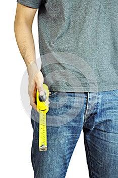 A man holding a tape measure