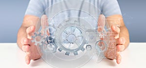Man holding a technology gear wheel interface3d rendering