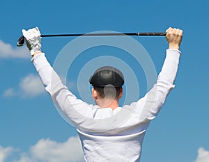 man holding a thing for golf