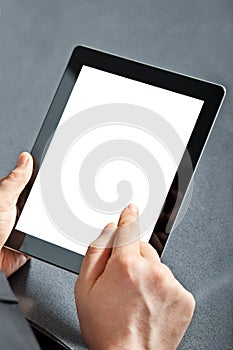 Man holding a touchpad photo