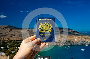 Man holding UK passport