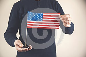 Man holding a united states flag