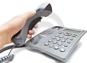 Man holding up the phone receiver