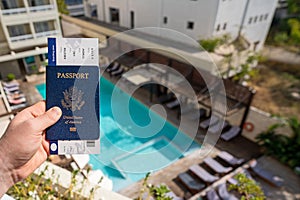 Man holding USA passport