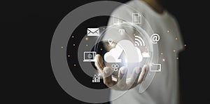 Man holding virtual cloud computing storage, network information, technology digital online storage.