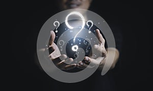 Man holding virtual question mark  for question and answer , Problem solving and solution concept