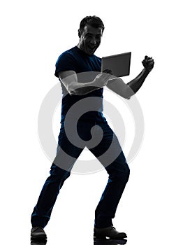 Man holding watching digital tablet silhouette