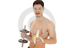 Man holding weight and banana