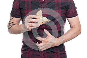 Man holding wheat bread, celiac disease or coeliac condition