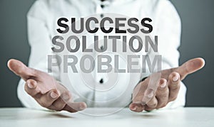 Man holding words. Problem, Solution, Success