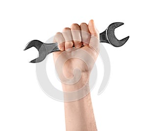 Man holding wrench isolated on white, closeup