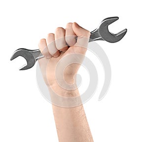 Man holding wrench isolated on white, closeup