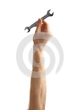 Man holding wrench on white background.