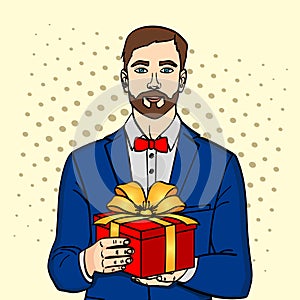 Man holds big gift box. Vector in retro comic pop art style. A guy with christmas or birthday gift.