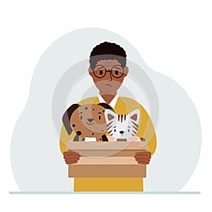 A man holds a cardboard box with a cat and a dog. The concept of rescue, help and care for pets.