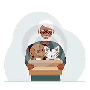A man holds a cardboard box with a cat and a dog. The concept of rescue, help and care for pets.