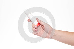 Man holds a glue stick in his hand on a white background, isolate. Close-up