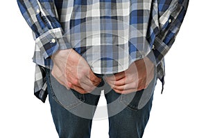 Man holds his ass, isolated on background. Hemorrhoids