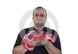 The man holds a large piece of delicious meat. The mouth is closed with a clasp. the concept of celebrating International Day
