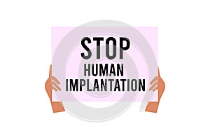 A man holds a placard with the inscription. Stop human implantation. A protest against the microchipping of people