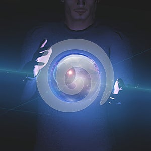 Man holds planet and space in sphere