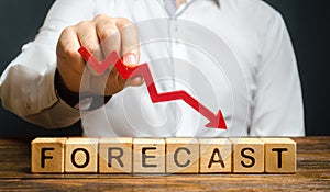 Man holds red arrow down over word Forecast. A budget shortage, recession economy, unprofitable company. Prediction of profit fall