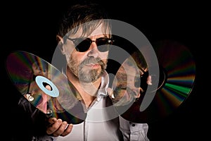 Man holds a retro laser discs
