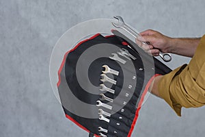 Man holds a set keys for car repair