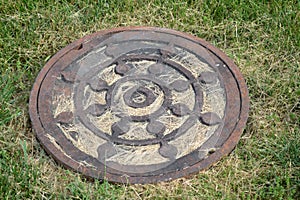 A Man Hole Cover Outdoors