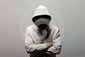Man in Hood. Boy in white hooded sweatshirt