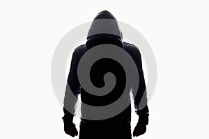 Man in Hood silhouette. Boy in a hooded sweatshirt