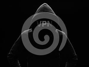 Man in a hoodie is hiding his face. Vpn concept
