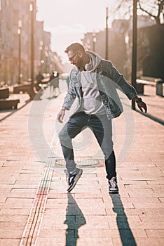 man in hoodie on a street dance