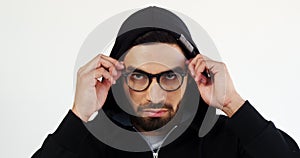 Man in hoodie wearing spectacles against white background 4k