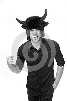 Man horns as devil or bull aggressive threaten violence gonna punch you. Aggressive intimidating individuals like to