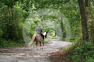 Man Horseback Riding