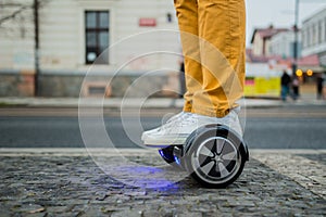 Man with hoverboard on the street