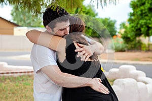 Man Hugs Wife Through Labor Contraction