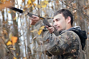 Man hunter outdoor in autumn hunting