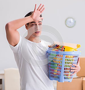 Man husband doing laundry at home