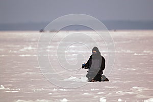 Man Ice Fishing