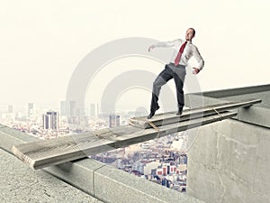 Man on improvised bridge
