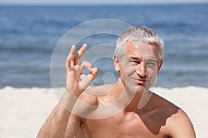 Man indicating OK sign photo