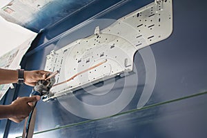 Man  install  Air Conditioner Unit