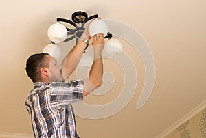 Man installing bulb