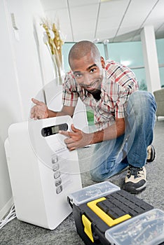 Man installing a dehumidifier