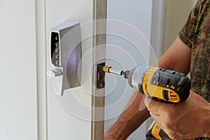 Man installing of the door lock security