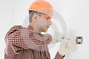 Man installing electrical box